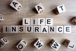 life insurance spelled out in wood blocks